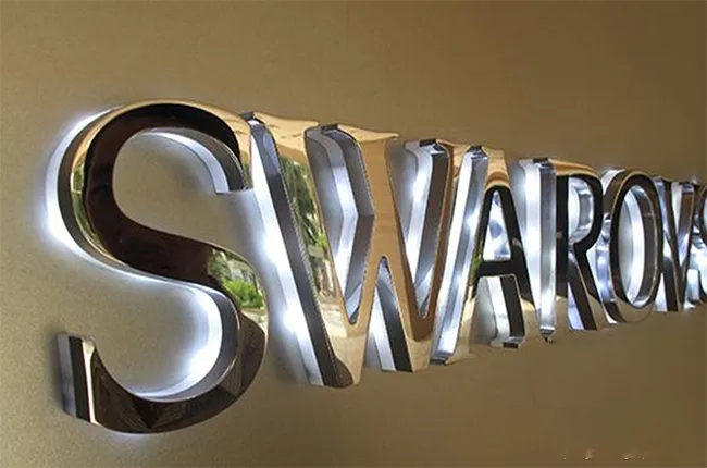 Chữ Inox Hắt Sáng Chân Đẹp Mắt Thiet ke chu inox hat sang chan la mot quy trinh doi hoi su ti mi chinh xac va oc tham my cao